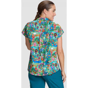 A short-sleeved women's top featuring a vibrant, multicoloured print with various characters and patterns.