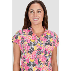 Ari Top (Print) in vibrant pink, yellow, and black floral pattern, featuring a collared neck and short sleeves.