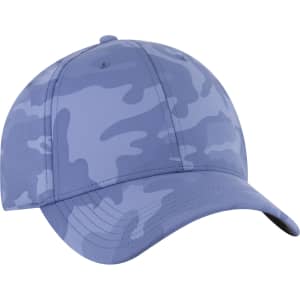 A blue camo patterned cap featuring a curved brim and a logo. Ideal for casual wear.