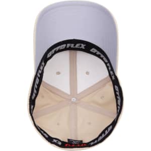 A beige and light purple 6 panel low profile baseball cap with an inner logo detailing.