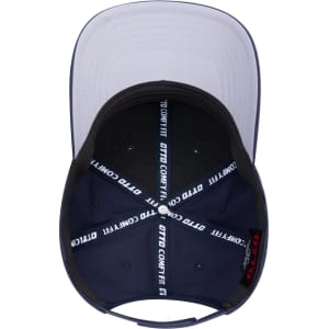 A navy and grey 6 panel mid profile baseball cap featuring an inner comfort fit band and a logo.