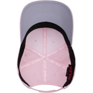 A six-panel mid-profile baseball cap in pink with a grey peak. Features an inner lining and a logo inside.