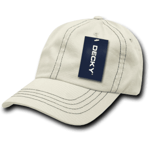 A beige 6-panel low profile dad hat with relaxed fit and contrasting stitching, featuring a tag and logo.
