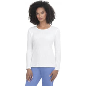 A white long-sleeve tee shirt with a textured pattern, displayed on a model. The tee has a round neckline and fitted sleeves.