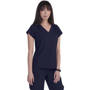 A navy top with a V-neck and short sleeves, featuring a pocket and a branding logo.