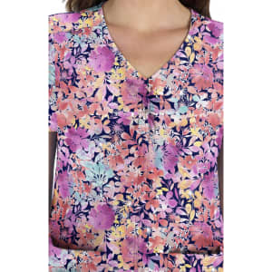 A floral print top featuring vibrant shades of purple, pink, and blue, with a V-neck design and a logo.