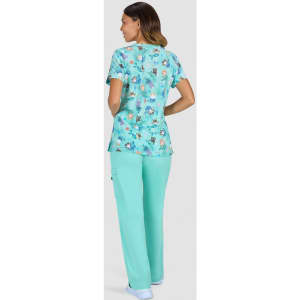 A patterned top featuring a variety of colours in turquoise, paired with matching aqua trousers.