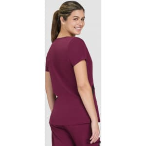 A maroon Sari Top with a classic cut, featuring short sleeves and a back view of the model. Branding is visible.