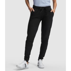 Black women's track pants with a fitted design, featuring pockets and an elasticised waistband.