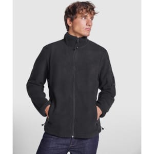 A black fleece jacket with a collar, featuring side pockets and a logo on the sleeve.