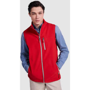 A red vest with a zippered front and pockets, worn over a blue shirt. It features a logo on the chest.