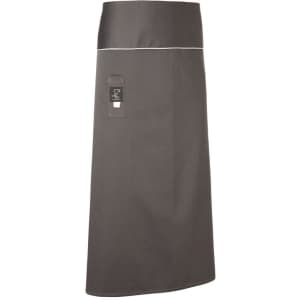 A dark grey apron featuring a pocket and a label, designed for workwear purposes.