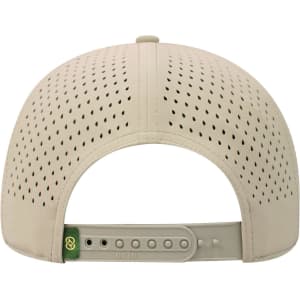 A beige perforated cap featuring a snapback closure and branding on the strap at the back.