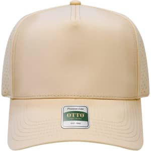 A beige 5 panel cap with perforated sides and a logo badge on the front.