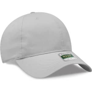 A light grey low profile dad cap with a curved brim and an attached logo.