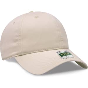 A light beige six-panel low-profile dad cap featuring a branded label.
