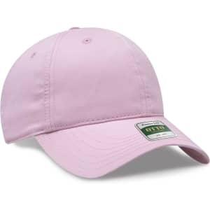 A pink six-panel low profile dad cap featuring a curved brim and a logo on the front.