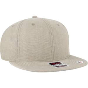 A beige 6 panel mid profile snapback cap with a flat brim and a logo on the side.