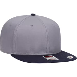 A grey snapback cap with a navy blue peak, featuring a branded label and a structured six-panel design.