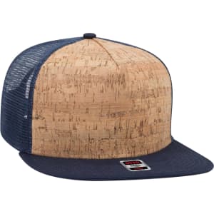 A cork and navy blue trucker cap with a mesh back and a branded label on the front.