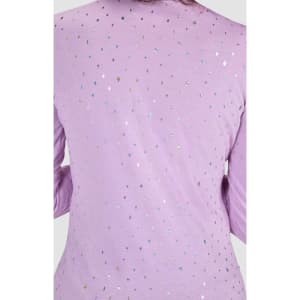 A lilac Tessa Tee with a sprinkle of shiny embellishments scattered across the fabric. The tee features a logo.