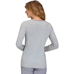 A grey long-sleeve tee with a dotted pattern, featuring a back view of a woman wearing it.
