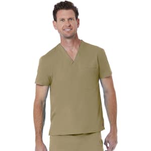 A man wearing a short-sleeved, khaki unisex V-neck top with a chest pocket. The top has a logo on it.