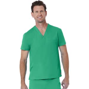 A green unisex V-neck top featuring short sleeves and a pocket on the front. The model is smiling and standing.