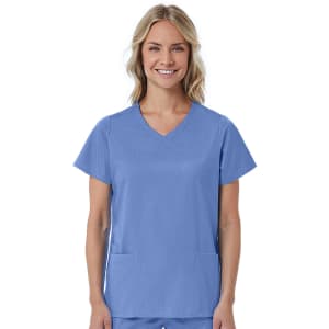 A women's mock wrap top in light blue, featuring short sleeves and two front pockets, with a logo.