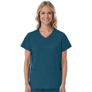 A women's mock wrap top in teal with short sleeves and two front pockets, featuring a logo.
