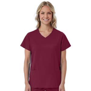 A red women's mock wrap top featuring short sleeves and two front pockets. The model is smiling at the camera.