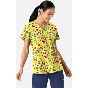 A women's yellow V-neck top featuring a playful print of cherries and bows. It has a logo on the side.