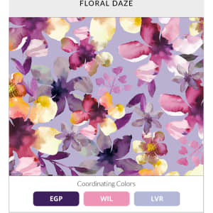 A floral print featuring purple, yellow, and pink hues with a variety of blossoms. Includes a branded label.