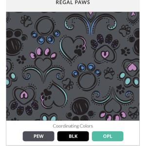 A patterned fabric featuring grey, pink, and blue paw prints and hearts on a dark background, with a logo present.
