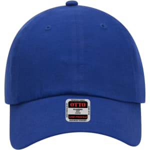A blue 6 panel low profile baseball dad cap with a label feature. The cap has a rounded crown and a curved brim.