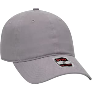 A grey 6 panel baseball cap with a curved brim and a logo on the side.
