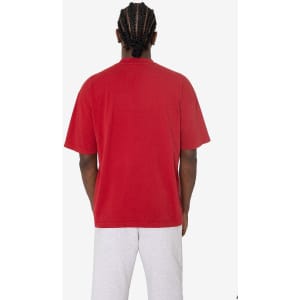 A red short sleeve crewneck tee is displayed, featuring a simple design and a relaxed fit.