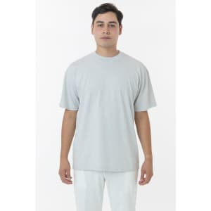 A short sleeve crewneck tee in a light grey colour, featuring a simple design and a logo.