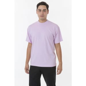 A short sleeve crewneck tee in a light purple colour, displayed on a model with a neutral background.