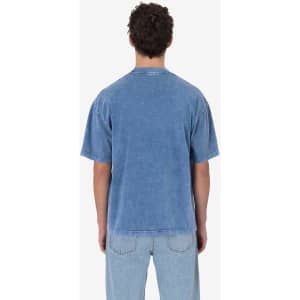 A blue short sleeve crew tee with a mineral wash finish, featuring a casual design and a logo.