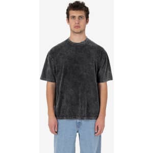 A short sleeve crew tee in mineral wash grey, featuring a relaxed fit and a visible logo.