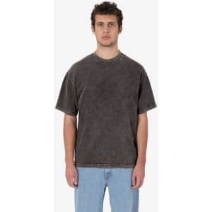 A short sleeve crew tee in a dark mineral wash, featuring a relaxed fit and contrast stitching.