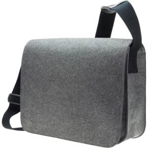 A grey satchel bag with a shoulder strap and a simple design. It features a logo on the front.