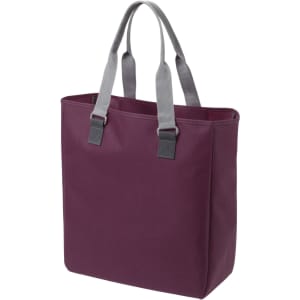 A reusable grocery bag in deep burgundy with grey handles, featuring a simple design and sturdy construction.