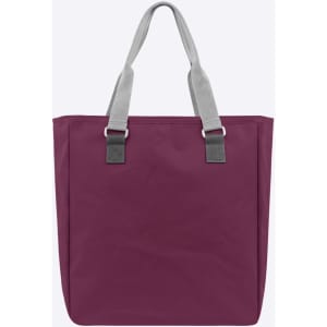 A reusable grocery bag in a deep plum colour with grey handles and a simple design, featuring a logo.
