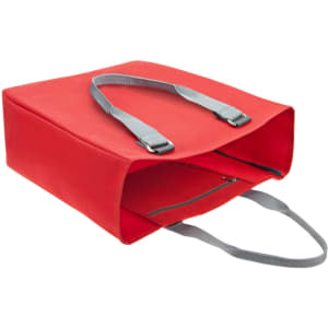 A red reusable grocery bag with grey straps and a zippered opening. It has a simple design and includes a logo.