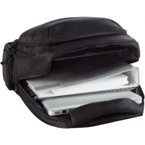 A black laptop bag with a zippered opening, revealing documents and a laptop inside. It features a logo on the exterior.