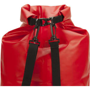 A red dry bag with a roll-top closure and adjustable black straps, featuring a hardware clasp.