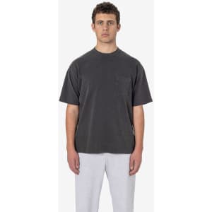 A grey short sleeve t-shirt with a pocket, featuring a relaxed fit and a logo.