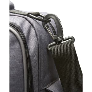 A grey bag featuring a black adjustable strap and a black clip attachment. Includes a logo on the side.